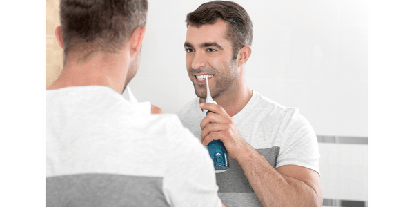 jak poprawnie czyścić zęby irygatorem krok po kroku